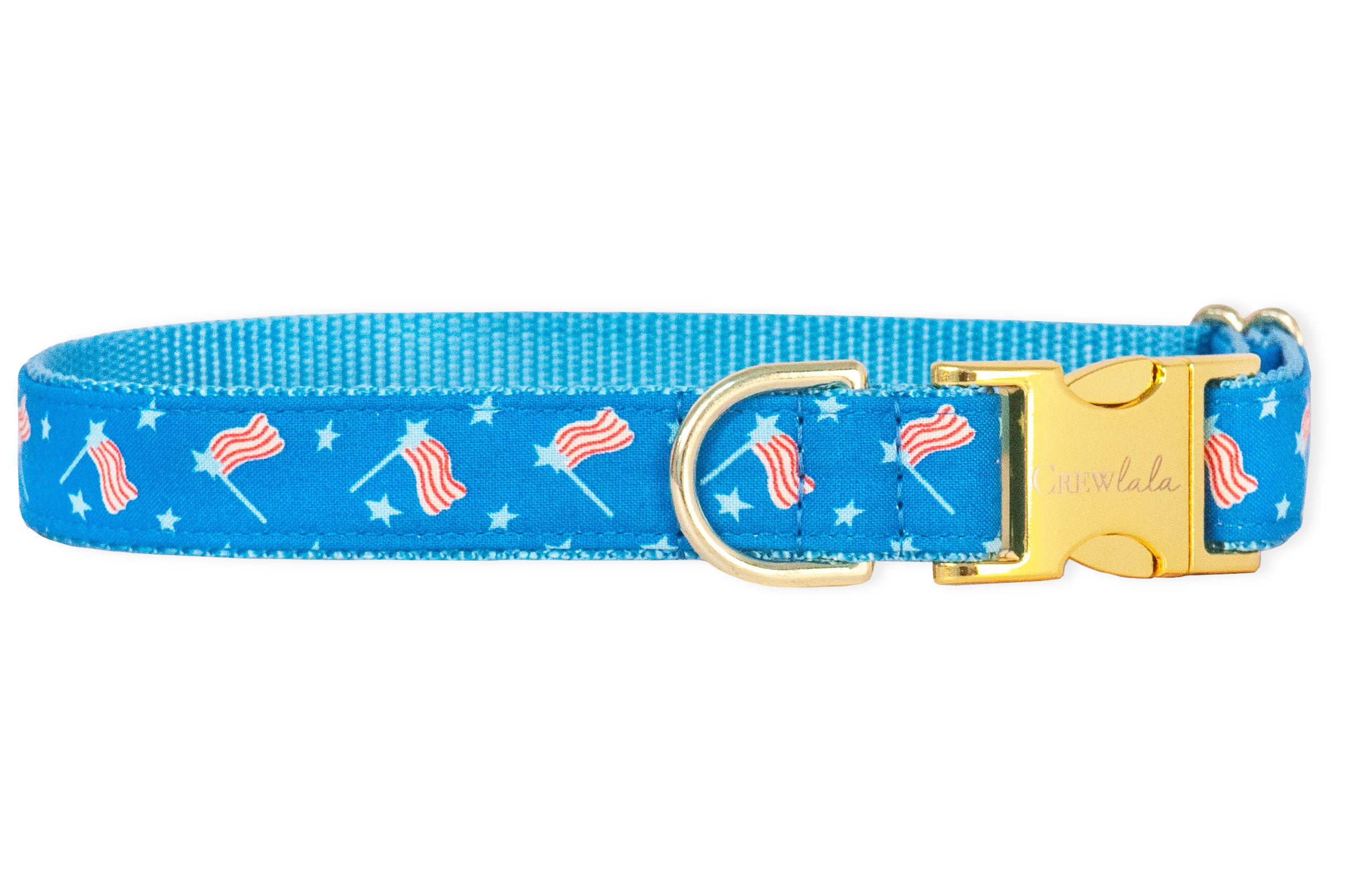 Patriotic dog collar with a vibrant blue strap covered in small American flags and stars, finished with polished gold-tone hardware and a sturdy side-release buckle.