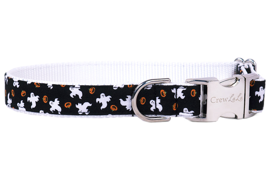 Halloween-themed dog collar decorated with ghost figures and pumpkin icons on a black backdrop. Finished with polished hardware, making it a festive yet functional accessory for October adventures.