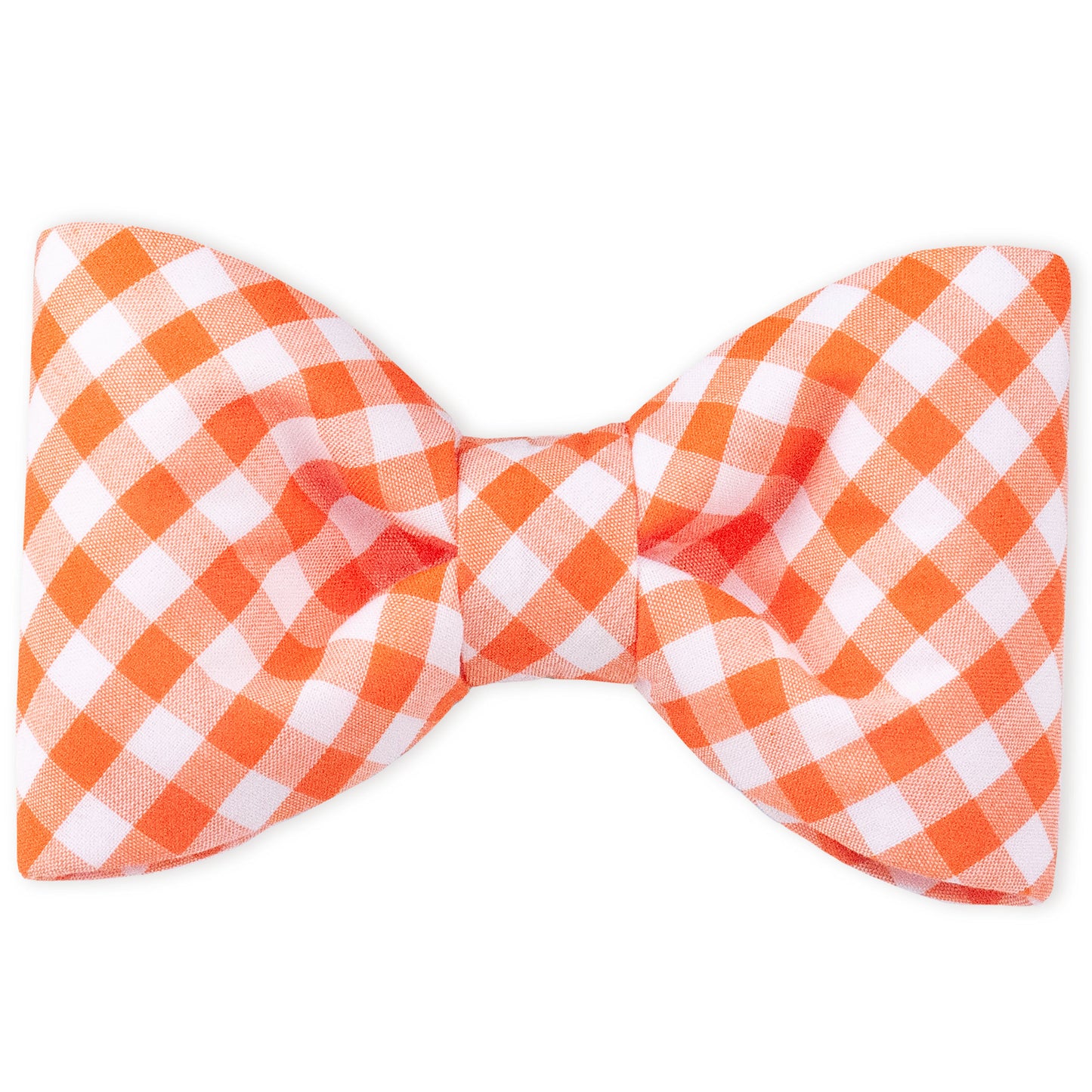 An orange plaid bow tie with clean lines and a full-bodied shape, designed to attach to a dogs collar. The bold plaid makes it perfect for fall strolls, family photos, or just fetching compliments.