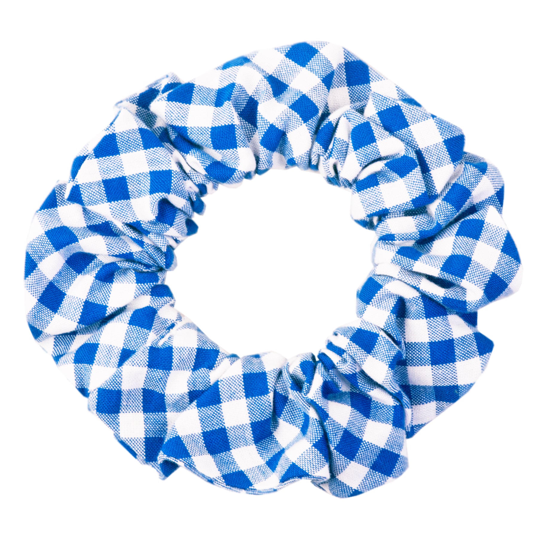 A blue and white picnic plaid hair scrunchie for humans, made from soft, gathered fabric with a checkered pattern. The elastic interior creates a ruffled circular shape, ideal for securing ponytails or buns with a casual, classic touch.