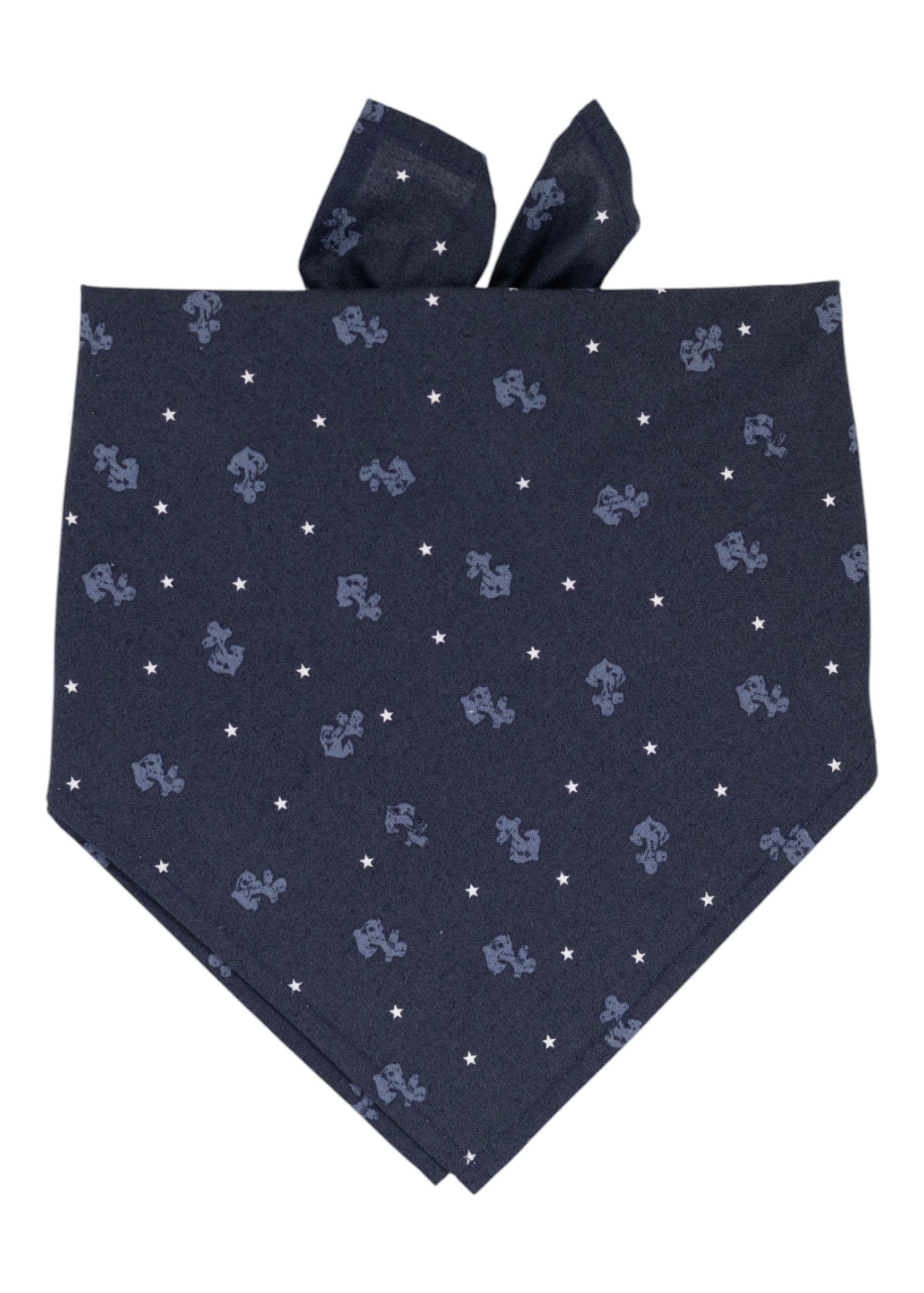 A navy blue nautical themed fabric bandana for dogs, decorated with a repeating pattern of light blue anchors and white stars, neatly folded with tied ends visible at the top.