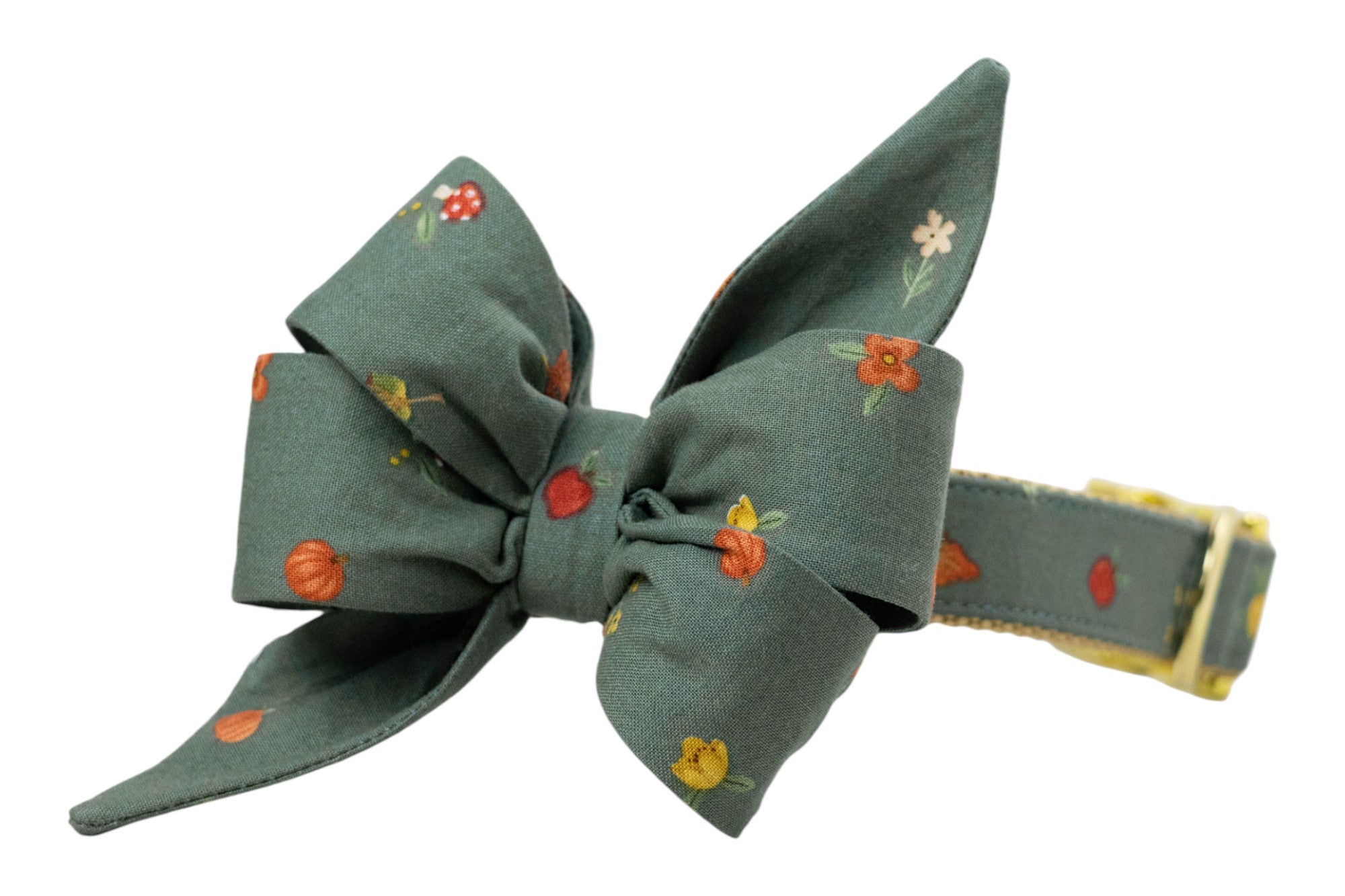 Chic dog collar with a large, matching, double-layered bow in green fabric, patterned with vibrant fall illustrations like berries, sunflowers, and leaves. Designed for eye-catching seasonal photos and festive outings, with sturdy construction and luxe buckle.