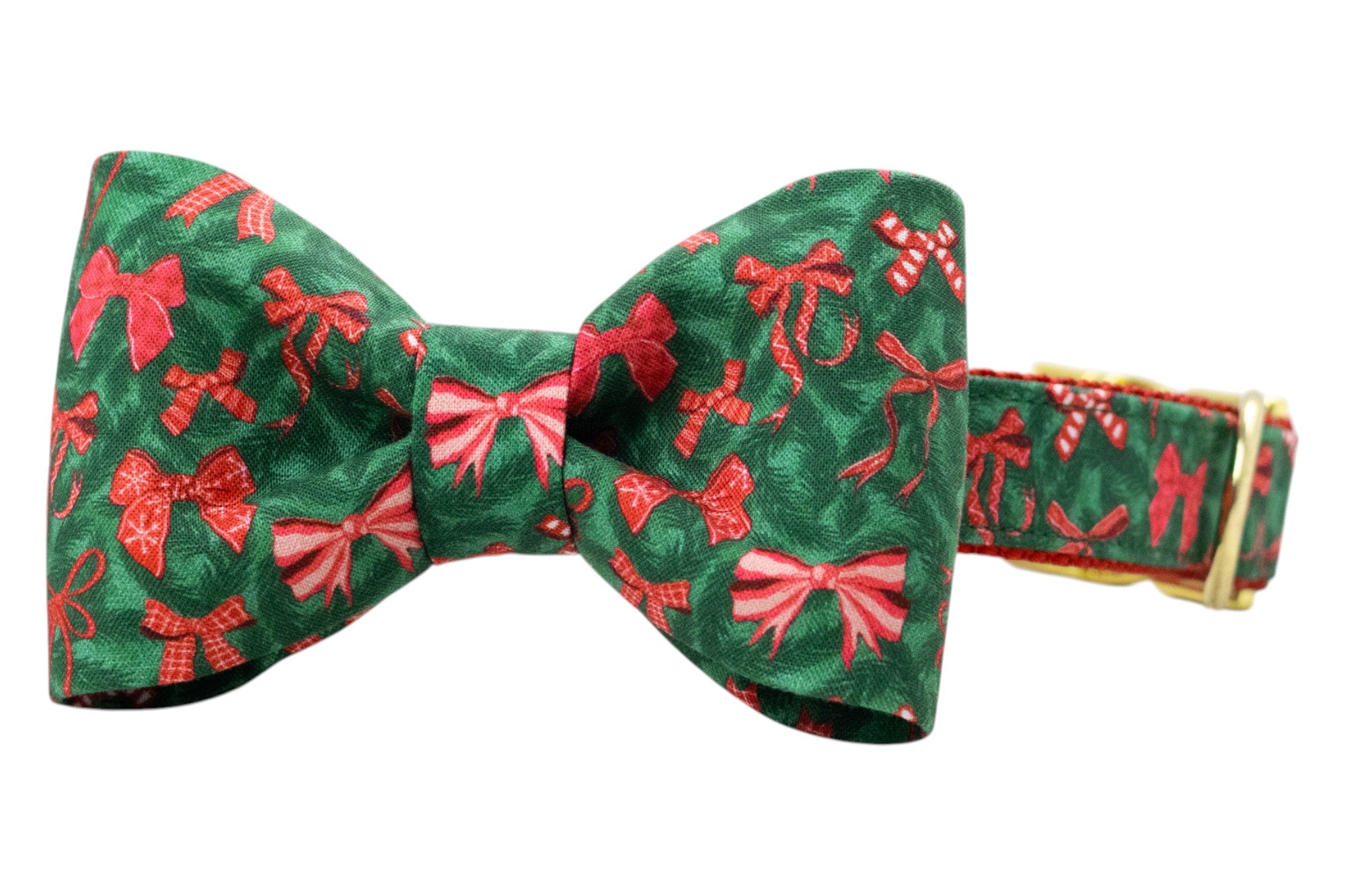 Holiday-themed dog collar with a neatly shaped, matching green bow tie attached at the center, with an all-over pattern of bows and candy canes. The collar is constructed with nylon webbing for durability and finished with metal hardware, giving it a polished seasonal look.
