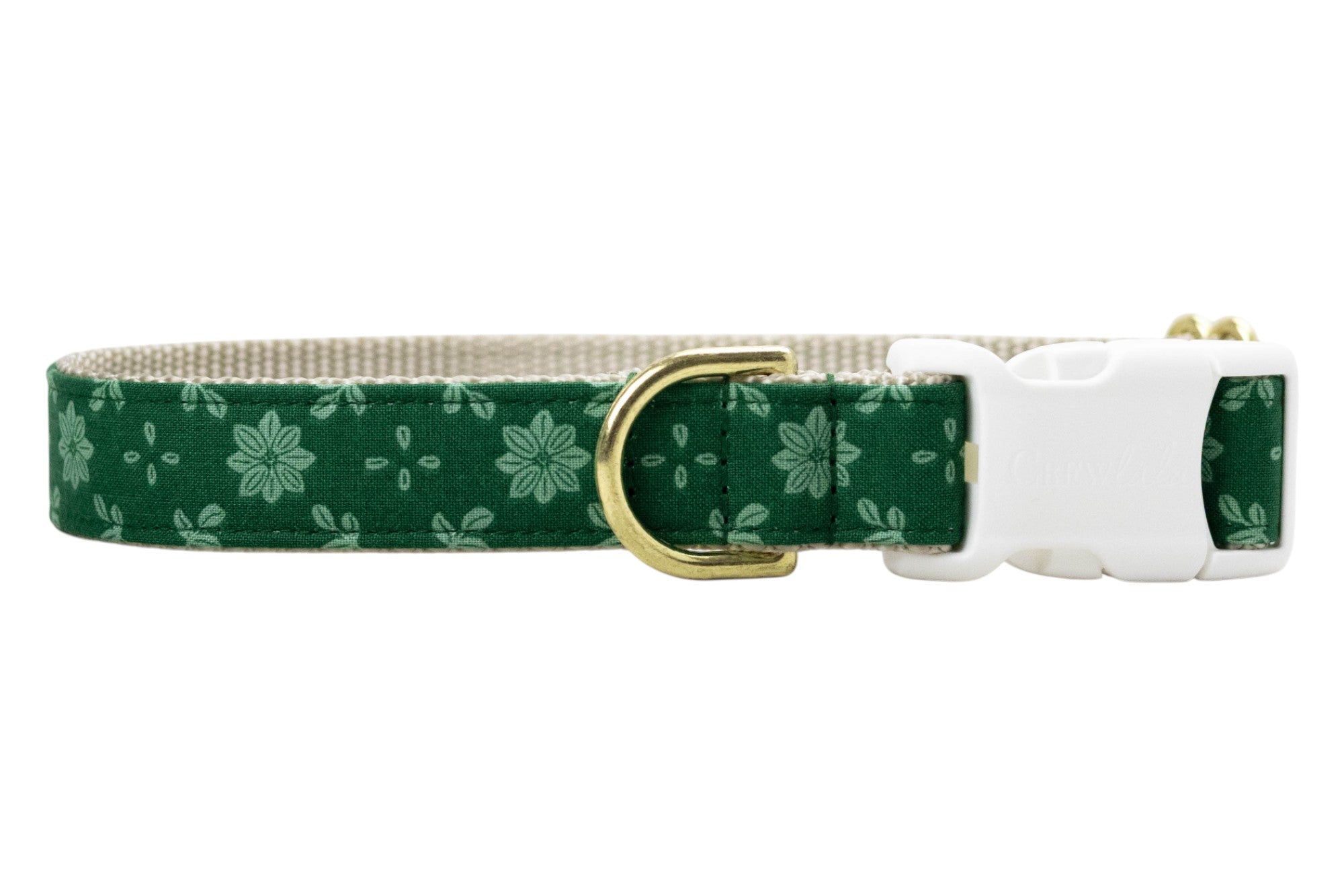 Floral dog collar crafted from green fabric with a light green symmetrical flower and dot pattern. The collar is constructed with a nylon woven backing and includes sleek  hardware: a branded buckle with “Crewlala” text and a matching D-ring for attaching accessories.