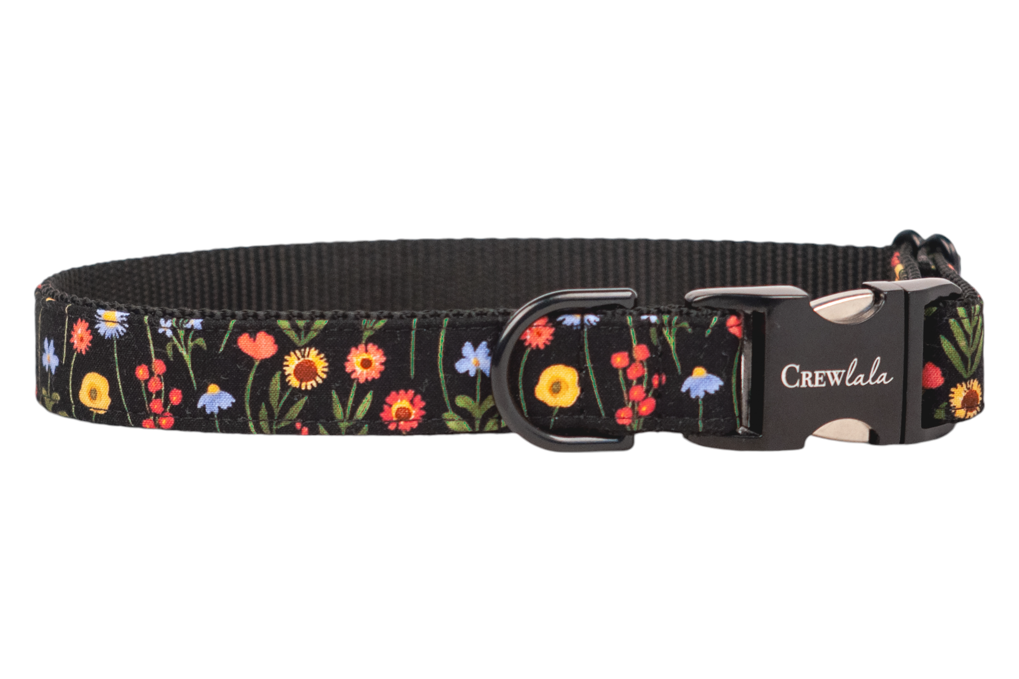 Adjustable black dog collar featuring a vibrant wildflower pattern. The collar includes a black metal D-ring for leash attachment and a sleek black side-release buckle engraved with the brand name “Crewlala.”
