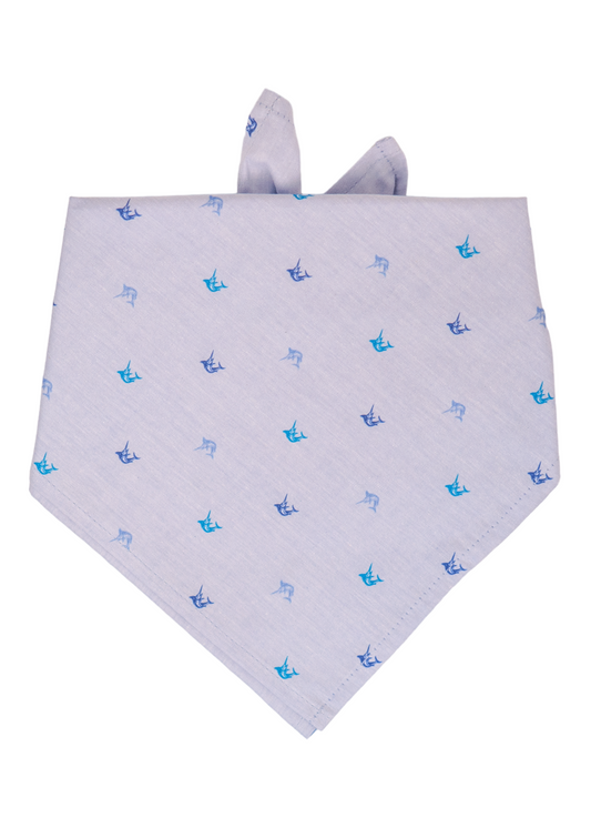 Nautical-themed dog bandana in light blue fabric, decorated with tiny marlin fish prints in different tones of blue, offering a crisp and coastal look.
