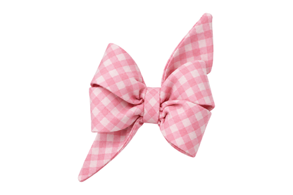 Standalone belle bow in Blush and Bashful Picnic Plaid fabric, a soft blush pink and white gingham check, with full upright loops and two pointed tails, photographed on a white studio background.