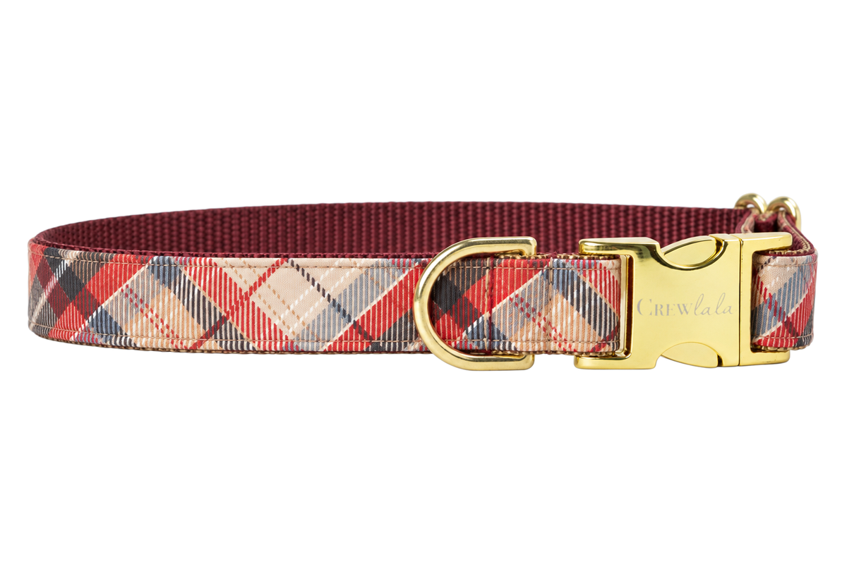 Plain Burbank Plaid dog collar without the bow, made with a tan and cream plaid with coral red and charcoal stripes, lined with burgundy nylon webbing and gold hardware with a Crewlala logo buckle.