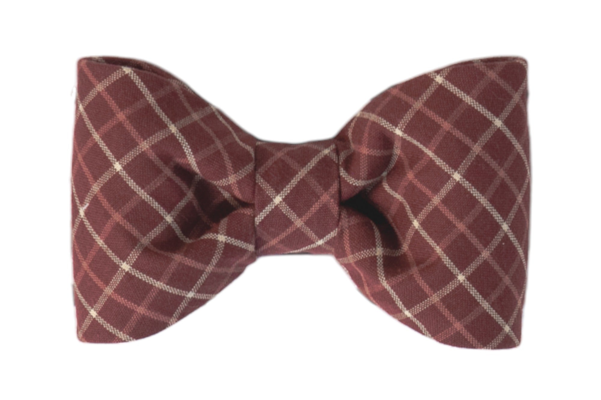 Classic dog bow tie in burgundy fabric with a diagonal plaid pattern. The symmetrical bow tie has gently curved edges and is cinched in the center, designed to attach to a collar as a polished accessory.