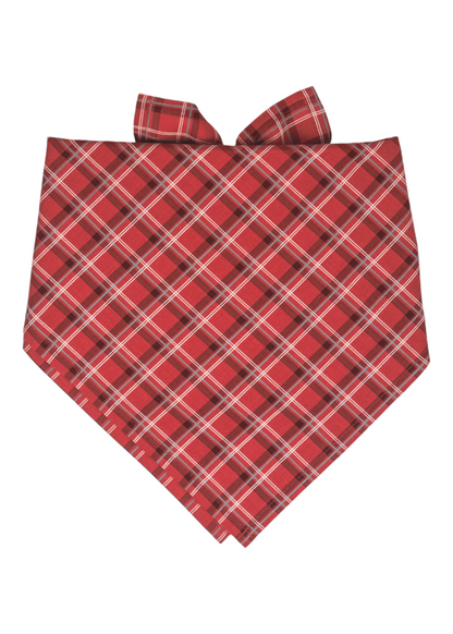  A classic dog bandana made from red fabric with a crisscross plaid pattern in. The bandana is folded into a triangular shape with pointed ends at the top tied into a bow, creating a polished and secure fit for your pup.