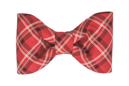 A handcrafted dog bow tie with a traditional red plaid design, perfect for cozy winter days, holiday gatherings, or any special occasion.