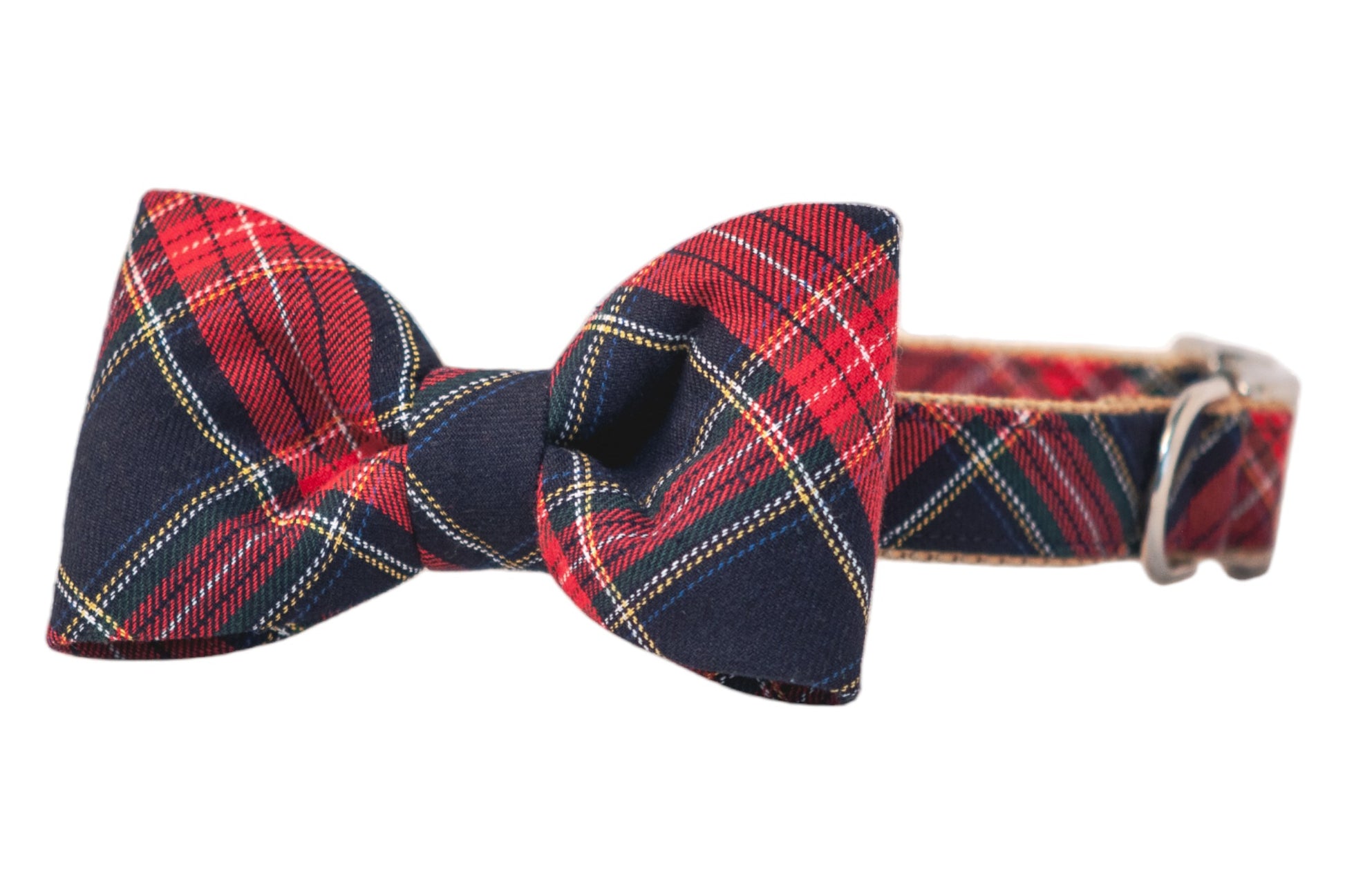 Classic bow tie dog collar in a red tartan pattern. The bow tie is centered and shaped evenly, and the collar has a metal buckle and D-ring.