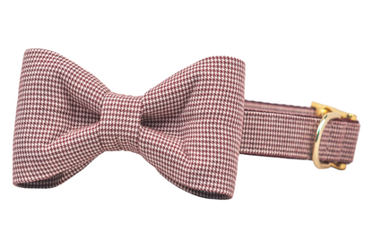 Dog collar with a matching attached classic bow tie in a burgundy houndstooth pattern, paired with metal hardware.