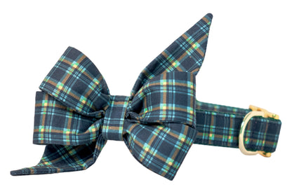 Elegant tartan plaid dog collar in rich navy tones, complete with a matching, bold bow tie for a sophisticated look. Finished with a metal buckle and D-ring, it blends style and function for special occasions or everyday wear.