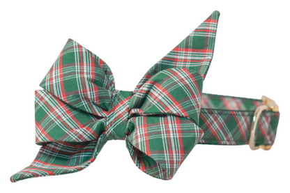 Holiday-inspired dog collar with an oversized tartan belle bow in a festive green plaid. The structured belle bow adds seasonal charm, while the polished buckle and D-ring provide both fashion and function.