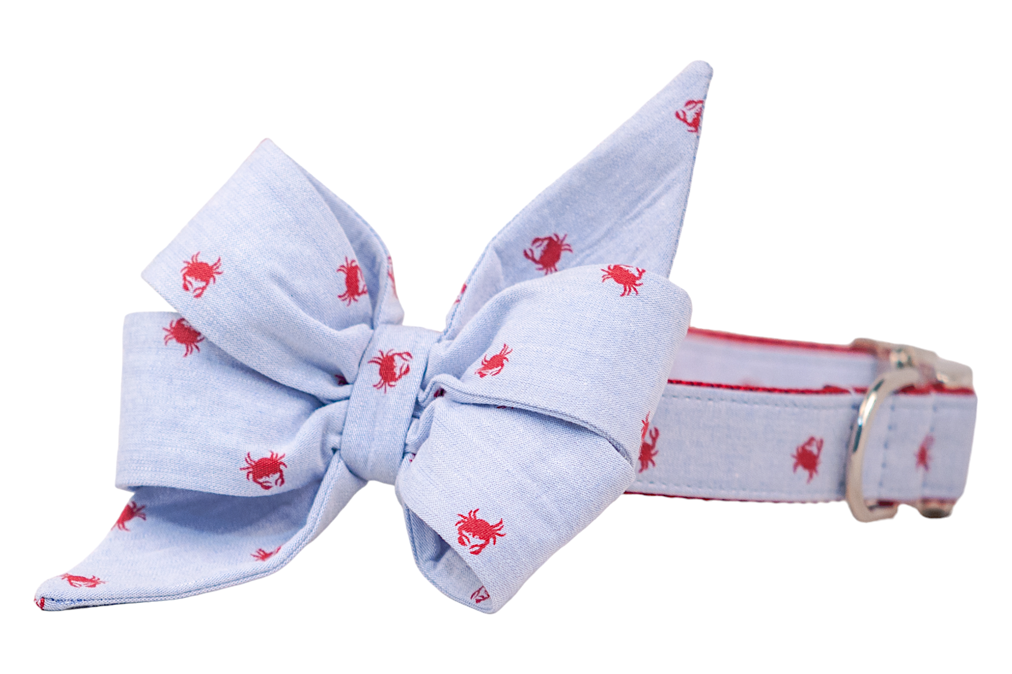Nautical-themed girl dog belle bow and collar set in light blue, decorated with tiny red crabs. The collar features silver accents, such as a d-ring and buckle.