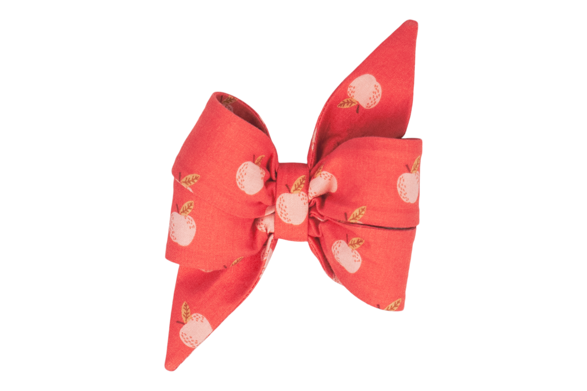 Beautifully crafted apple-themed girl dog belle bow on a deep coral background. Perfect for fall festivities, orchard outings, and everyday.