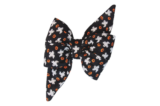 Halloween feminine dog belle bow with a black base decorated in cute ghost figures and tiny pumpkins. The extra-large size and sharp, pointed belle bow shape make it a standout accessory for pets celebrating Halloween in style.