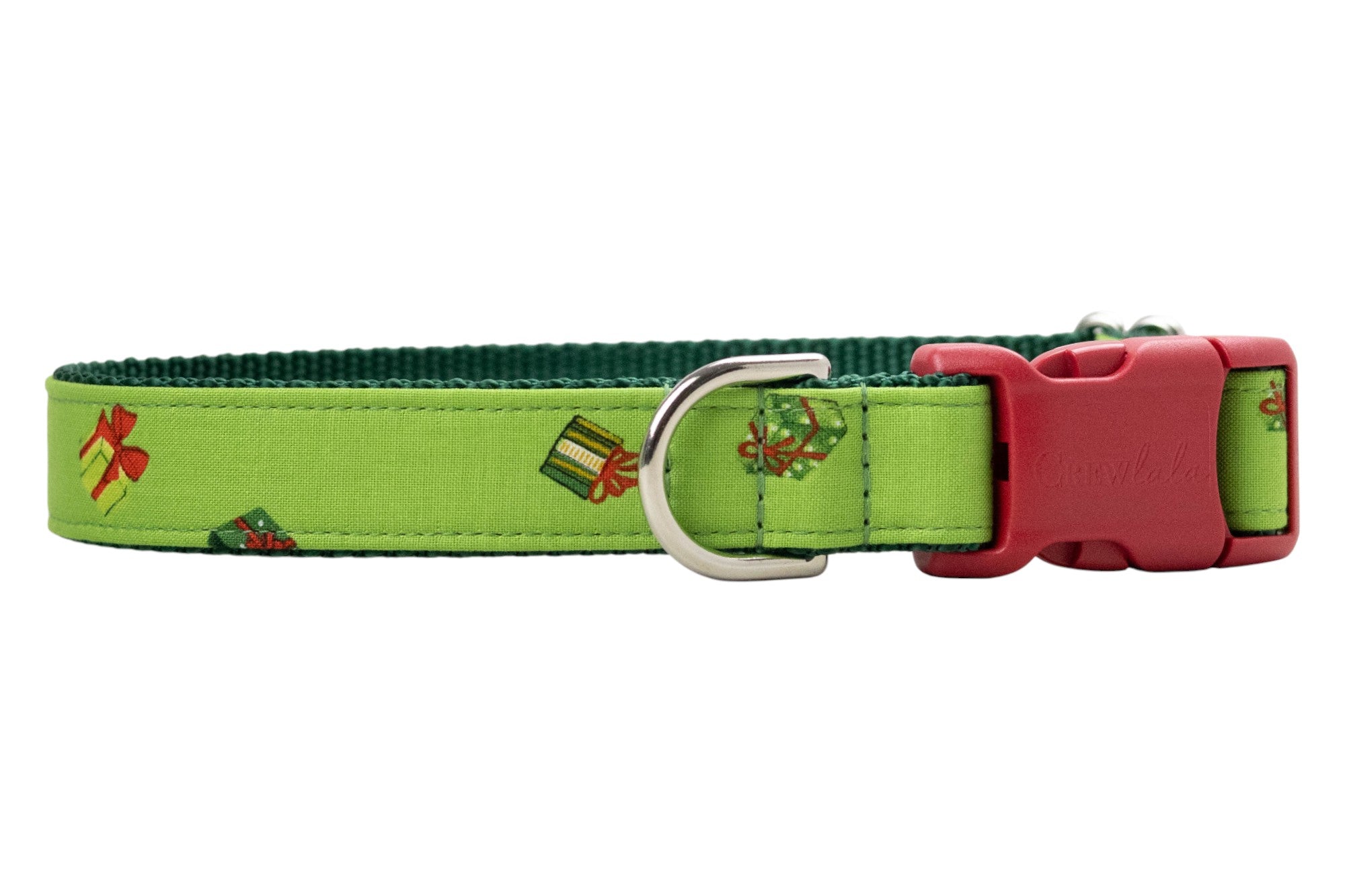 Festive dog collar made from bright green fabric printed with small colorful gift boxes in festive colors, each tied with decorative bows. The collar features dark green woven backing for durability, including a branded “Crewlala” buckle.