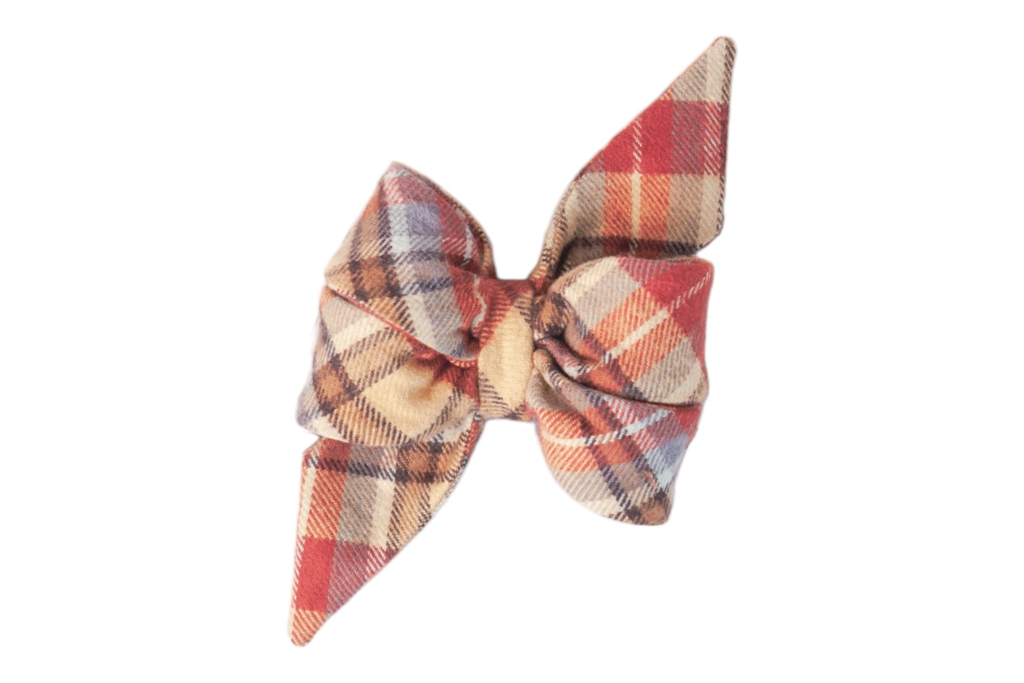 Flannel belle bow featuring a tartan plaid pattern of fall tones, cinched in the center with puffed loops and sharply tapered ends for a playful, feminine look.