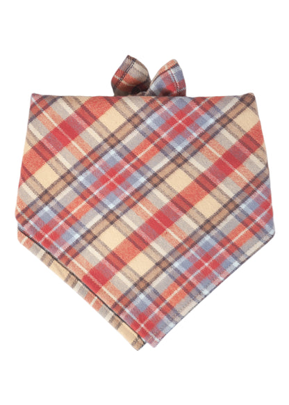Cozy plaid dog bandana in warm fall hues, crafted from flannel fabric.
