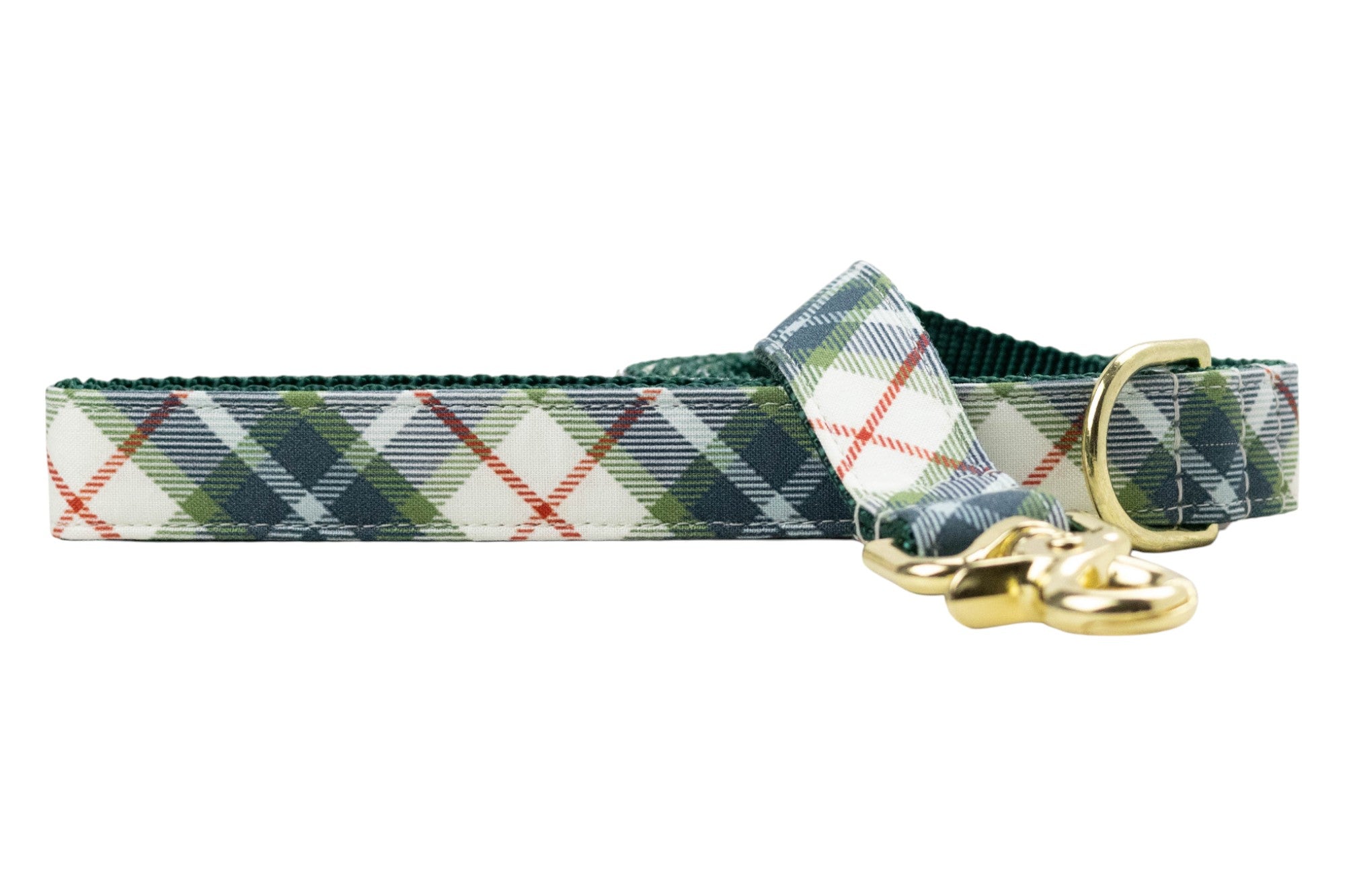 Dog leash with a tartan plaid pattern in olive green, accented with thin diagonal lines. The leash features durable green webbing on the underside, a metal swivel clasp, and a matching D-ring near the handle.