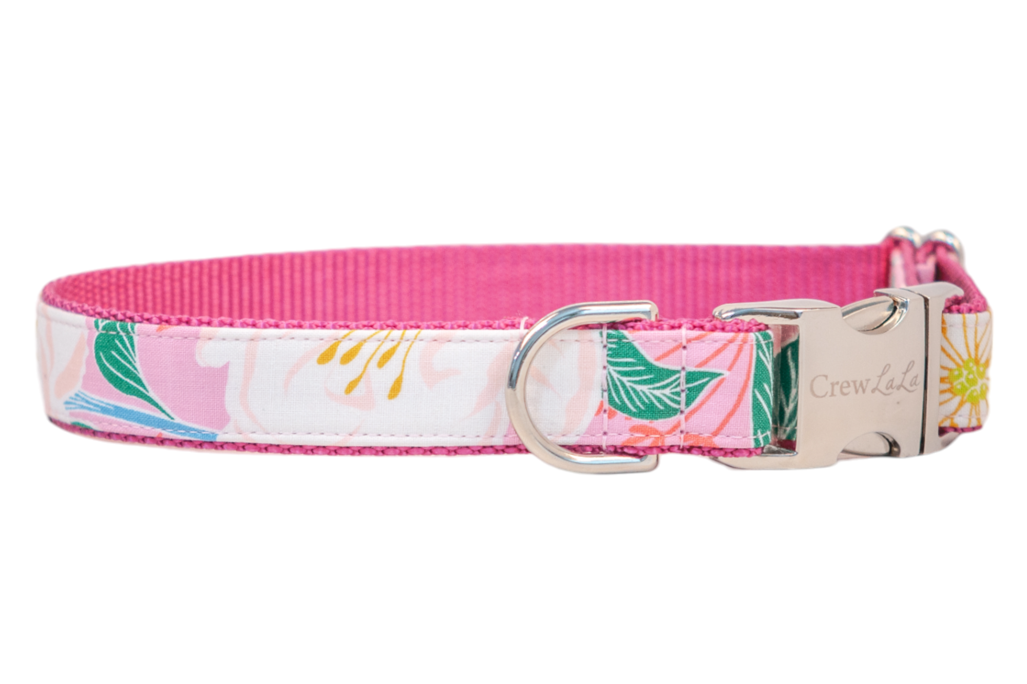 A vibrant pink dog collar featuring a tropical floral print with white blossoms, green leaves, and coral orange stems on a soft pink background, accented by a hot pink woven underside and a silver-tone buckle engraved with "Crewlala."