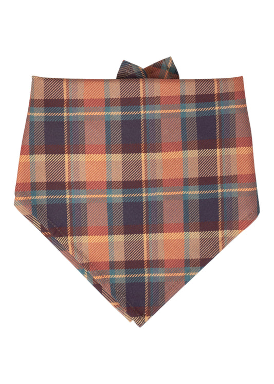 Folded plaid dog bandana in autumn-inspired colors, tied at the top.