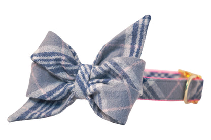 Large feminine belle bow in grey plaid with, attached to a matching dog collar with a metal buckle.
