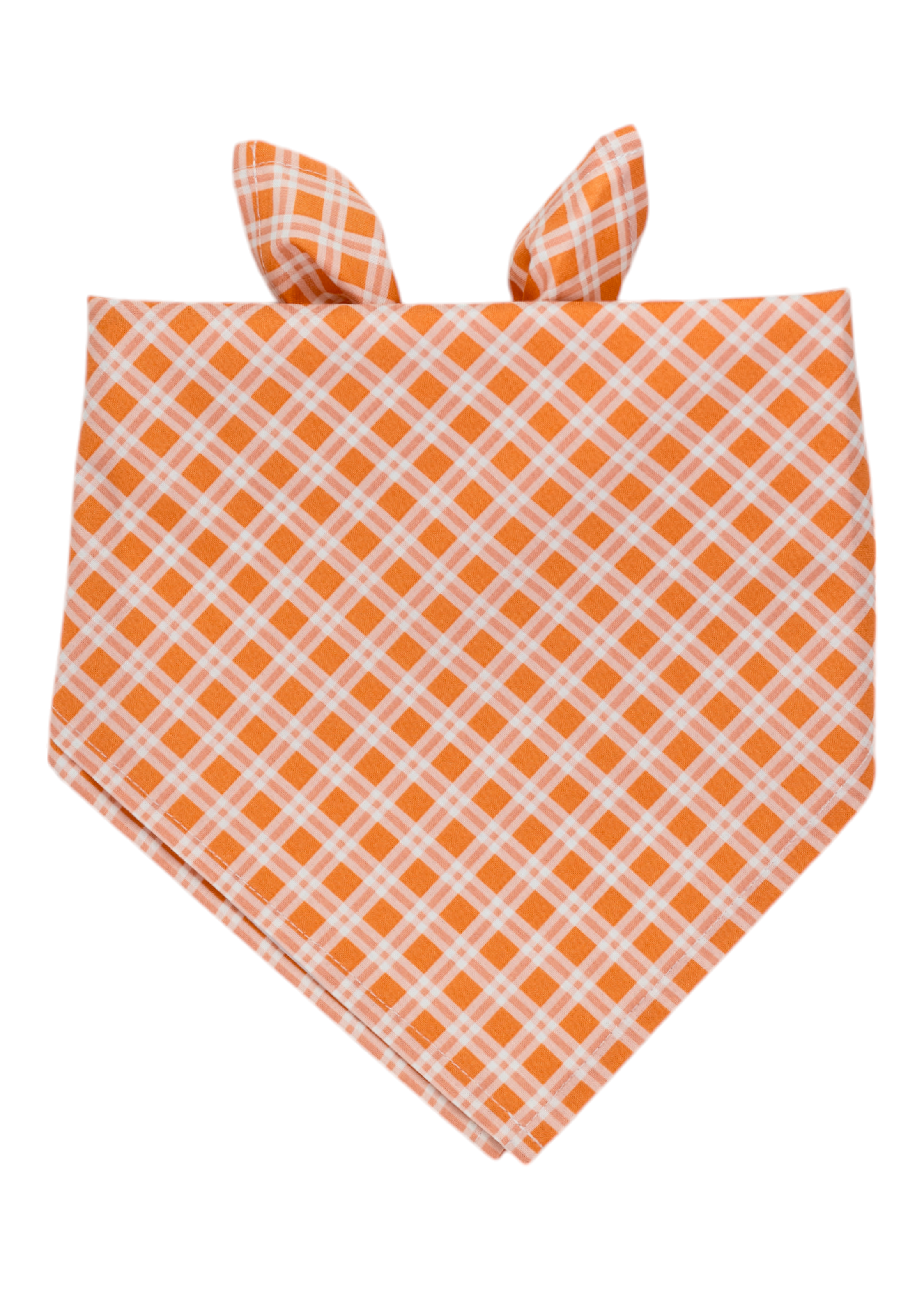Fabric bandana for dogs featuring an orange and white plaid design, styled in a classic tie-on shape.