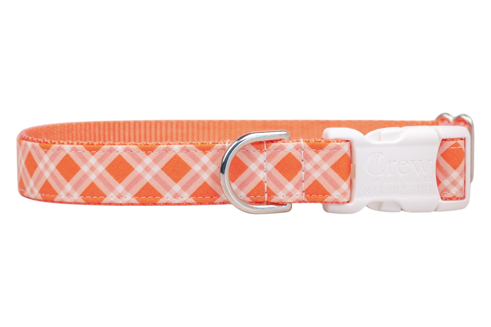 Plaid-patterned collar in shades of orange and white, designed for dogs with a white plastic buckle and a silver D-ring for leash attachment.