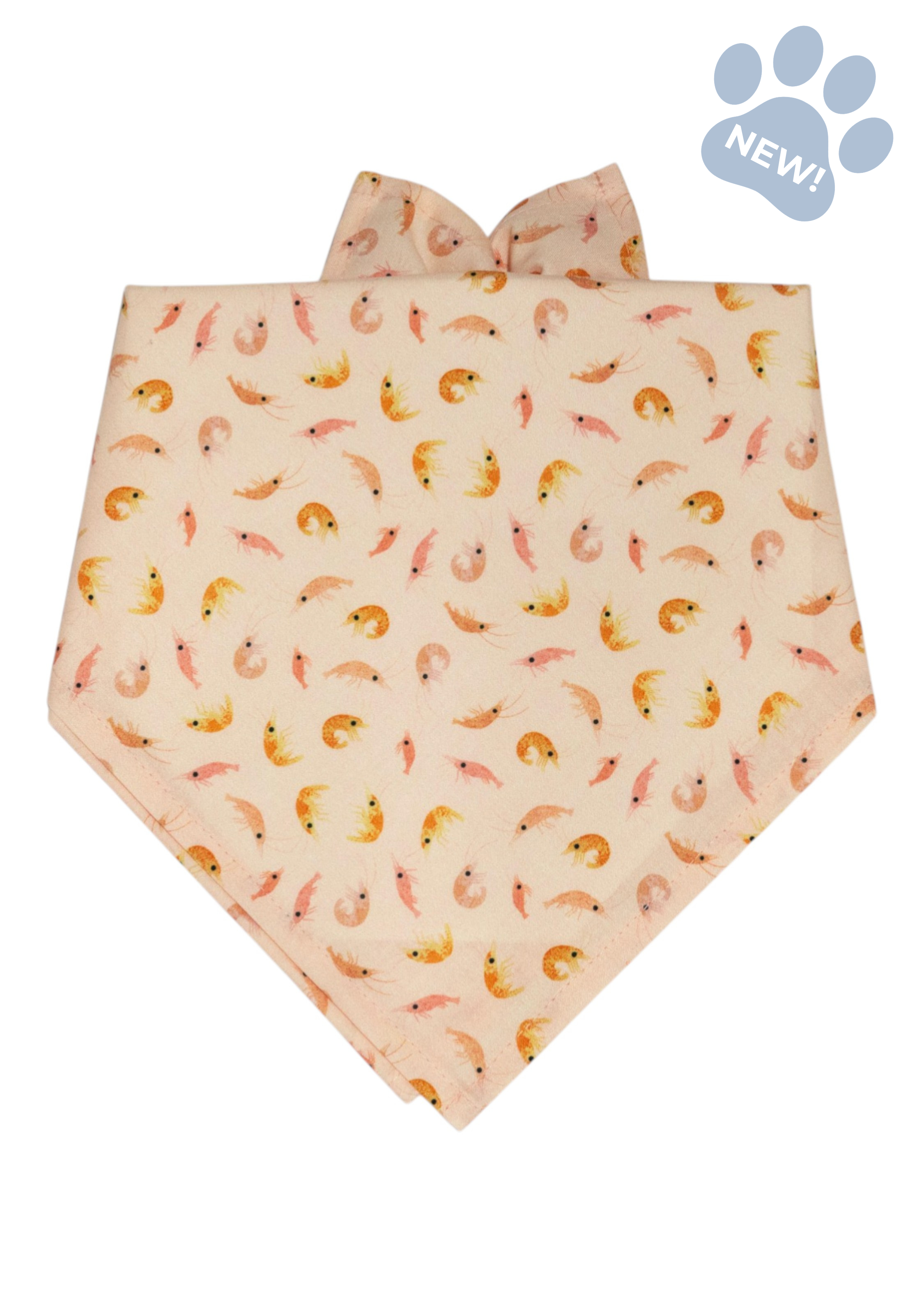 Soft dog bandana featuring a whimsical shrimp pattern in coral, pink, and orange on a neutral background.