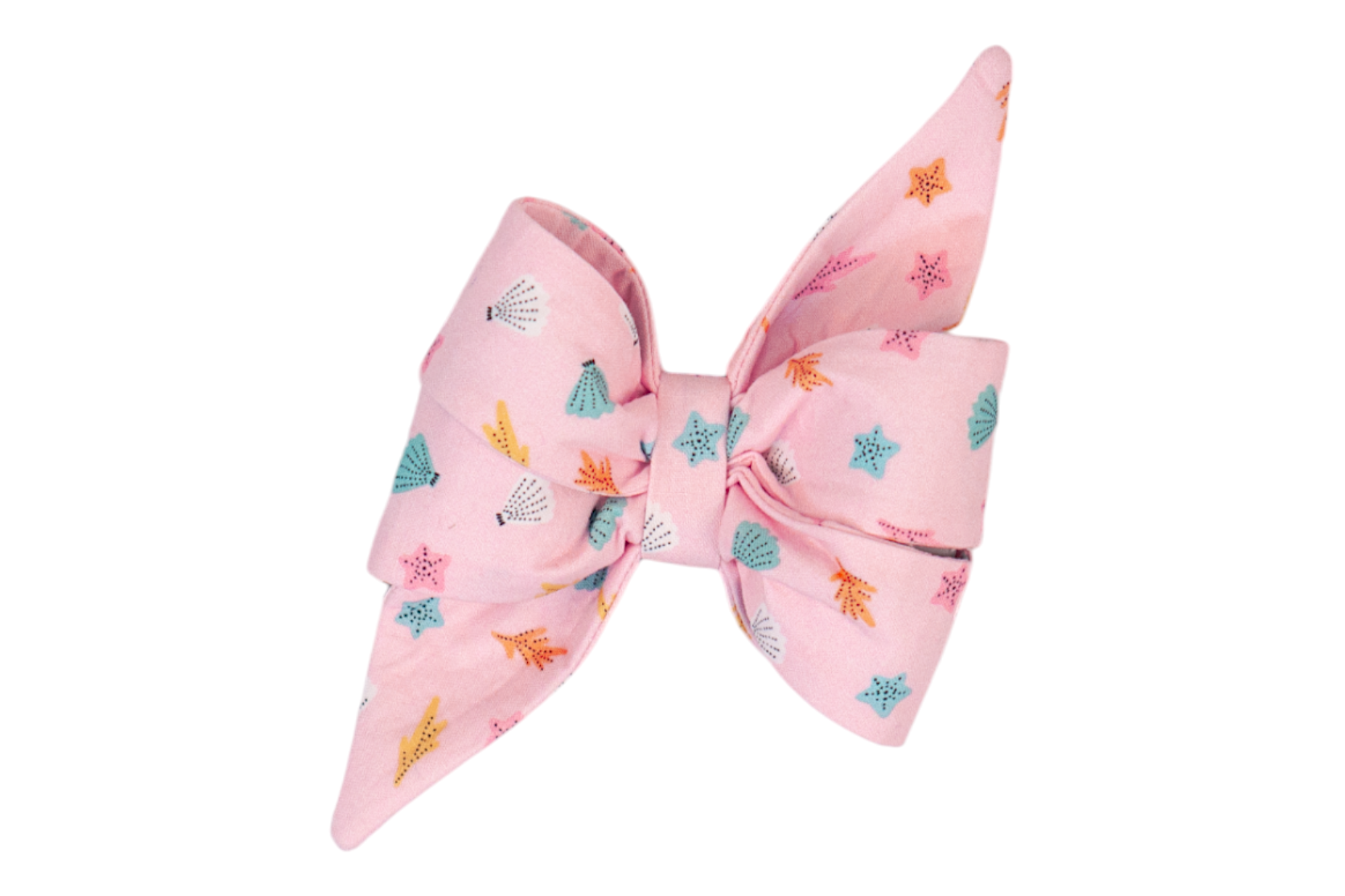 Oversized decorative belle bow in soft pink fabric adorned with small marine illustrations like shells, starfish, and sea plants in shades of blue, yellow, pink, and white. The bow is neatly tied with two full loops and extended, pointed ends, perfect for your favorite gal.