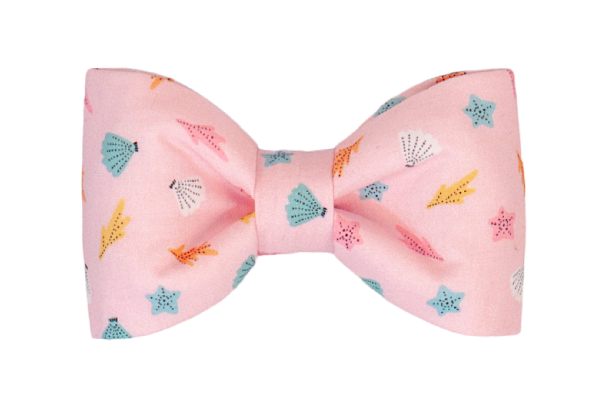 Fabric dog bow tie in light pink featuring a multicolored beach-themed design of shells, starfish, and underwater foliage. The design is balanced and whimsical, with gently curved loops and a clean, centered wrap.