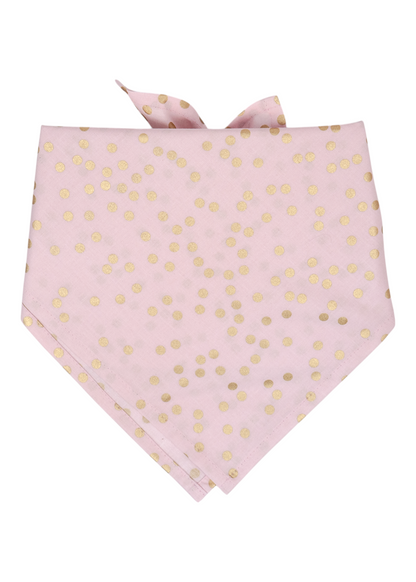 Pink dog bandana with a scattered gold polka dot pattern, folded into a triangle shape with a folded top edge for tying comfortably around the neck. The soft color and metallic accents give it a playful yet elegant finish.