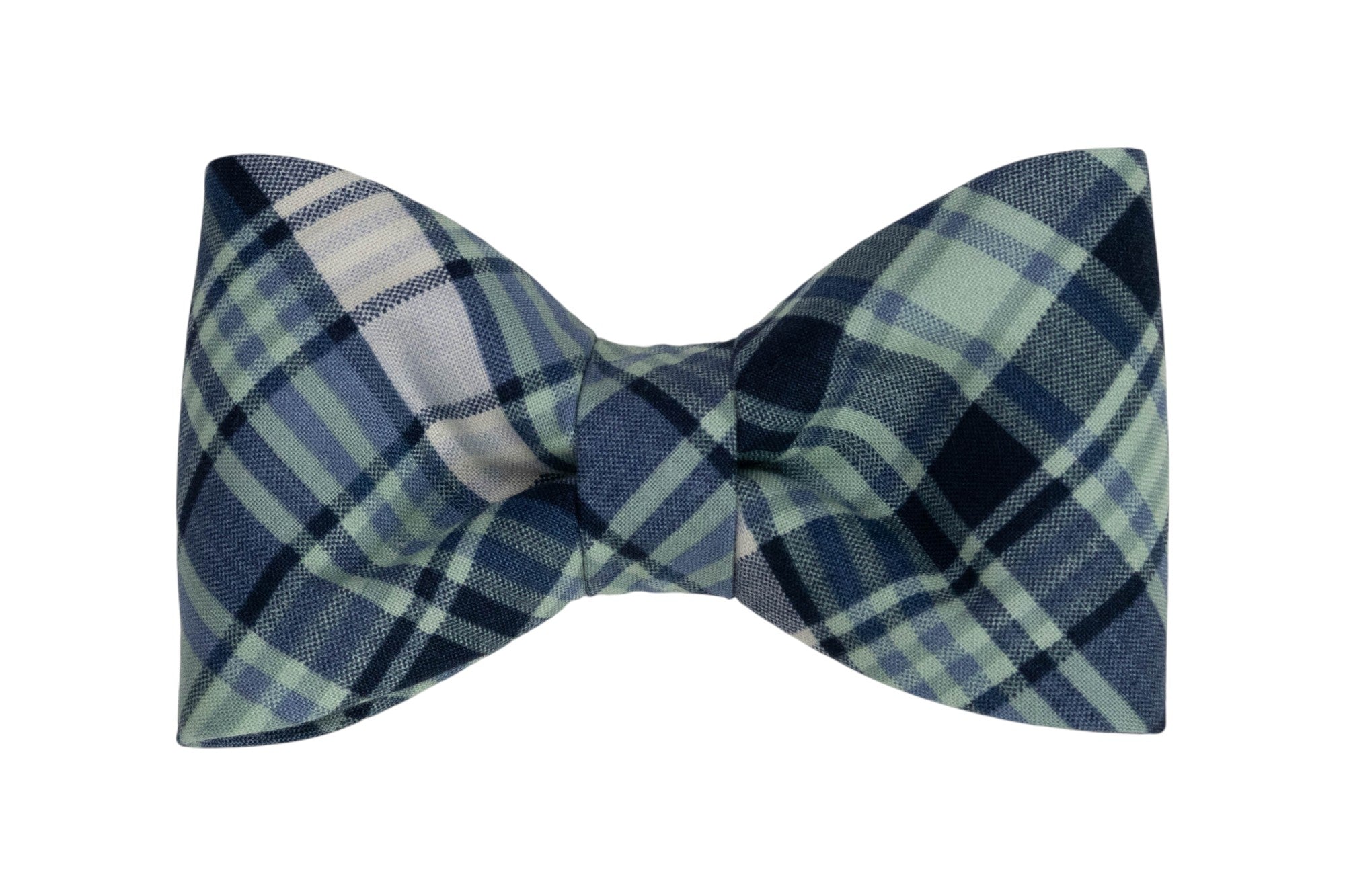 Classic dog bow tie made from soft fabric in a navy plaid pattern, featuring a symmetrical shape with gently rounded edges.