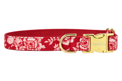 Plain Ruby Roses dog collar without the bow, made with a ruby red fabric with large blush pink and white roses, lined with red nylon webbing and gold hardware with a Crewlala logo buckle.