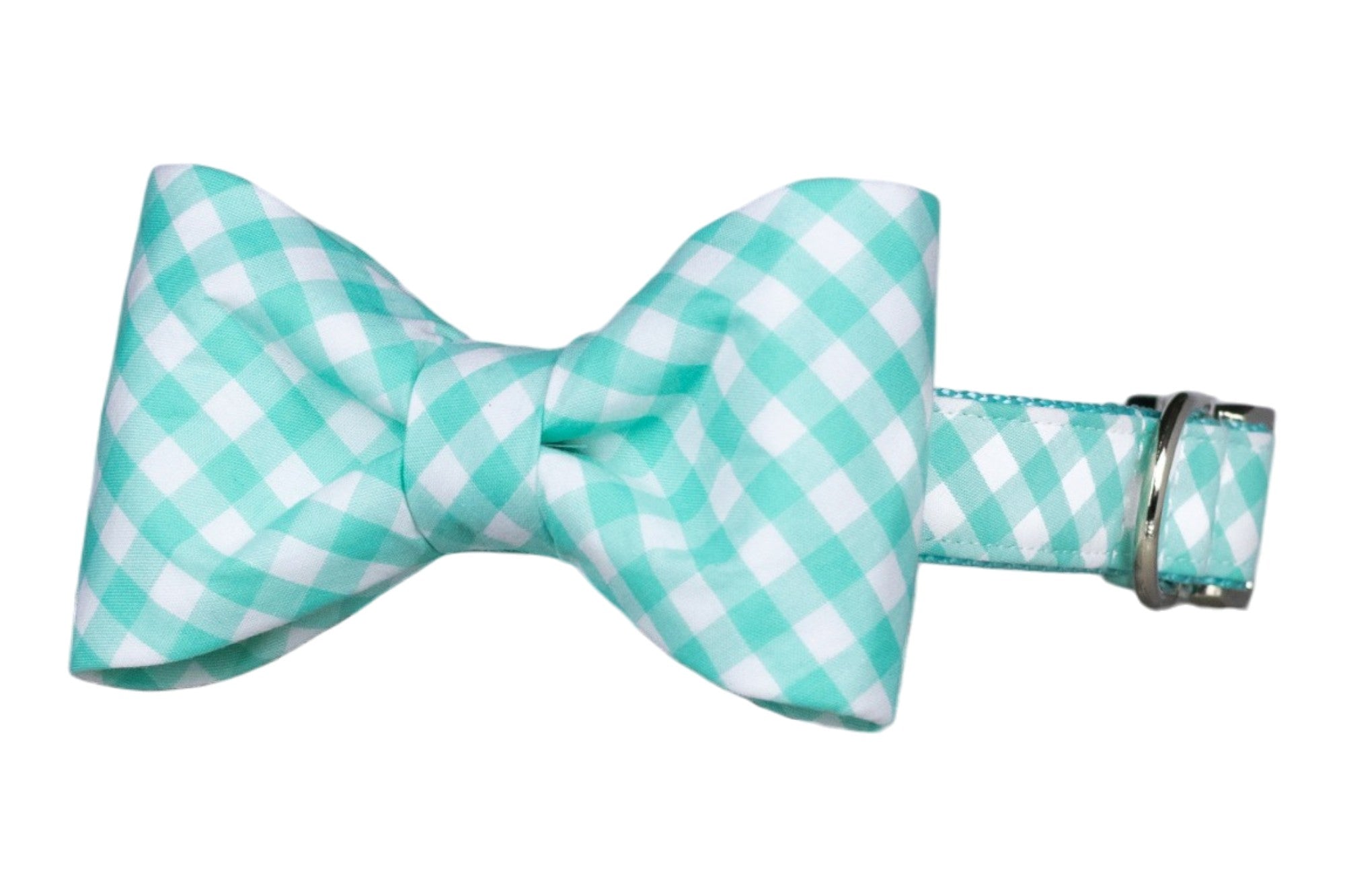 Seafoam green and white gingham dog bow tie attached to a matching collar, featuring a classic checkered pattern and a neatly knotted center. The coordinating collar includes silver-tone hardware and a matching fabric strap.