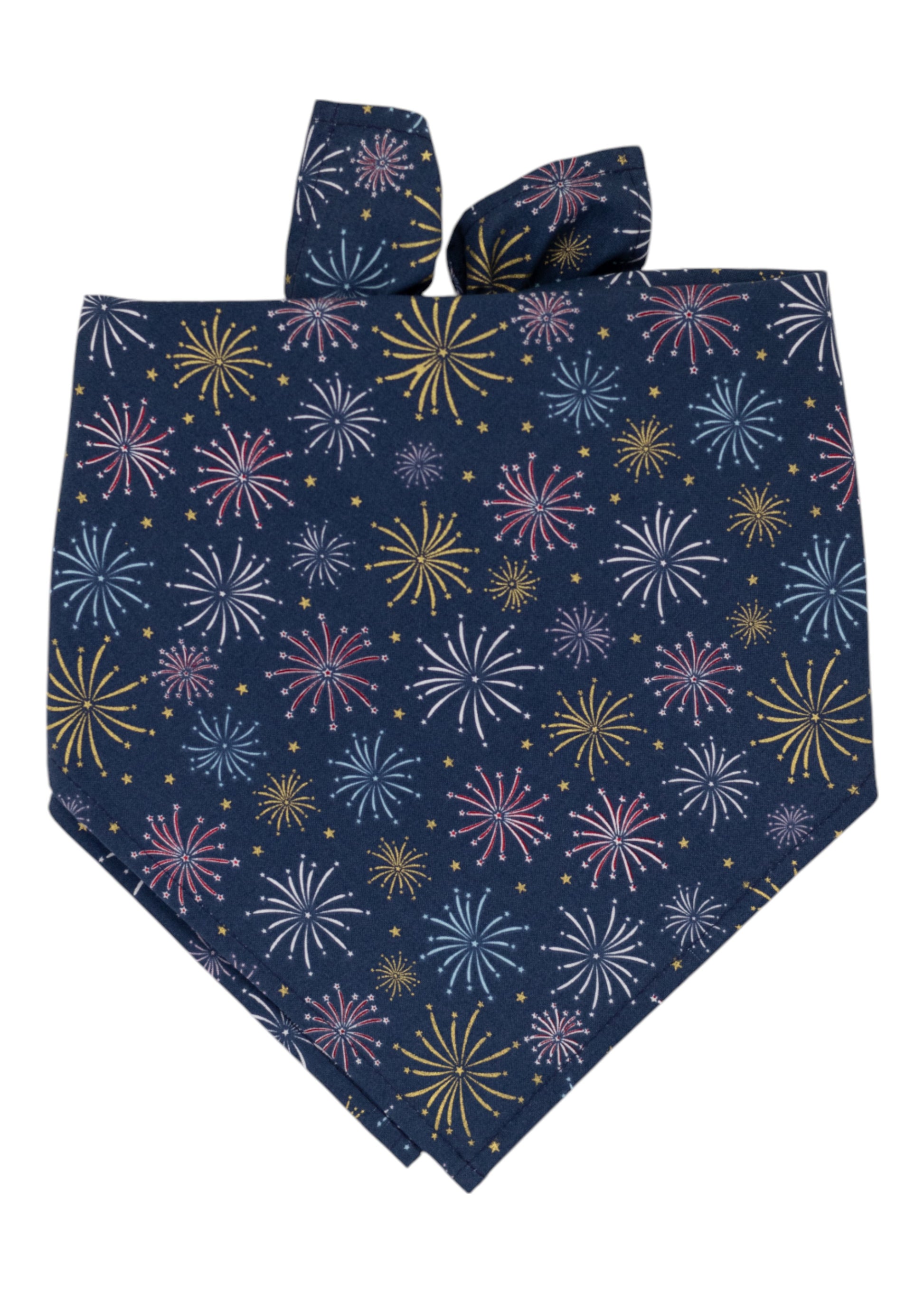 Navy blue dog bandana with a vibrant fireworks pattern in red, white, yellow, and blue, with small delicate stars. Perfect for July 4th or everyday!