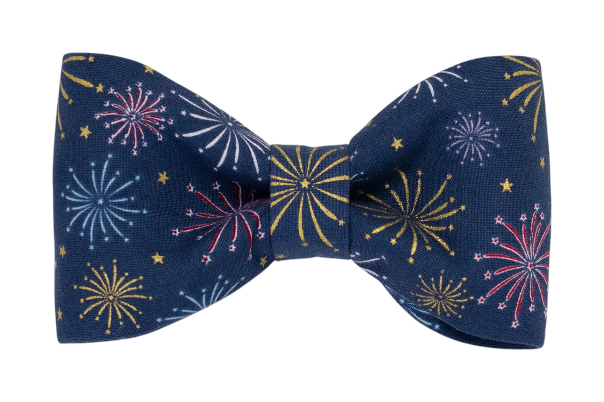 Festive dog bow tie featuring colorful fireworks and star patterns on a dark blue fabric—perfect for holidays like July 4th or any patriotic celebration.