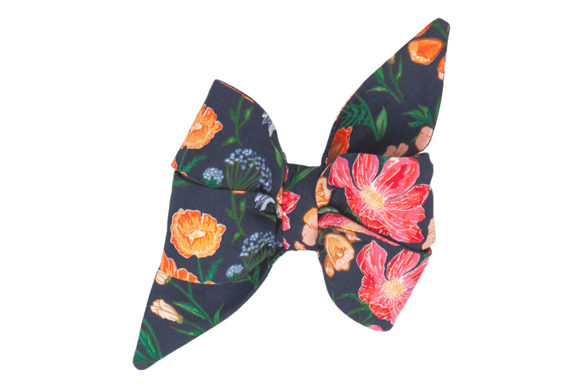 A handmade dog bow tie with a deep navy background, beautifully adorned with vibrant garden blooms in shades of red, orange, blue, and peach for a stunning botanical look for Fall.