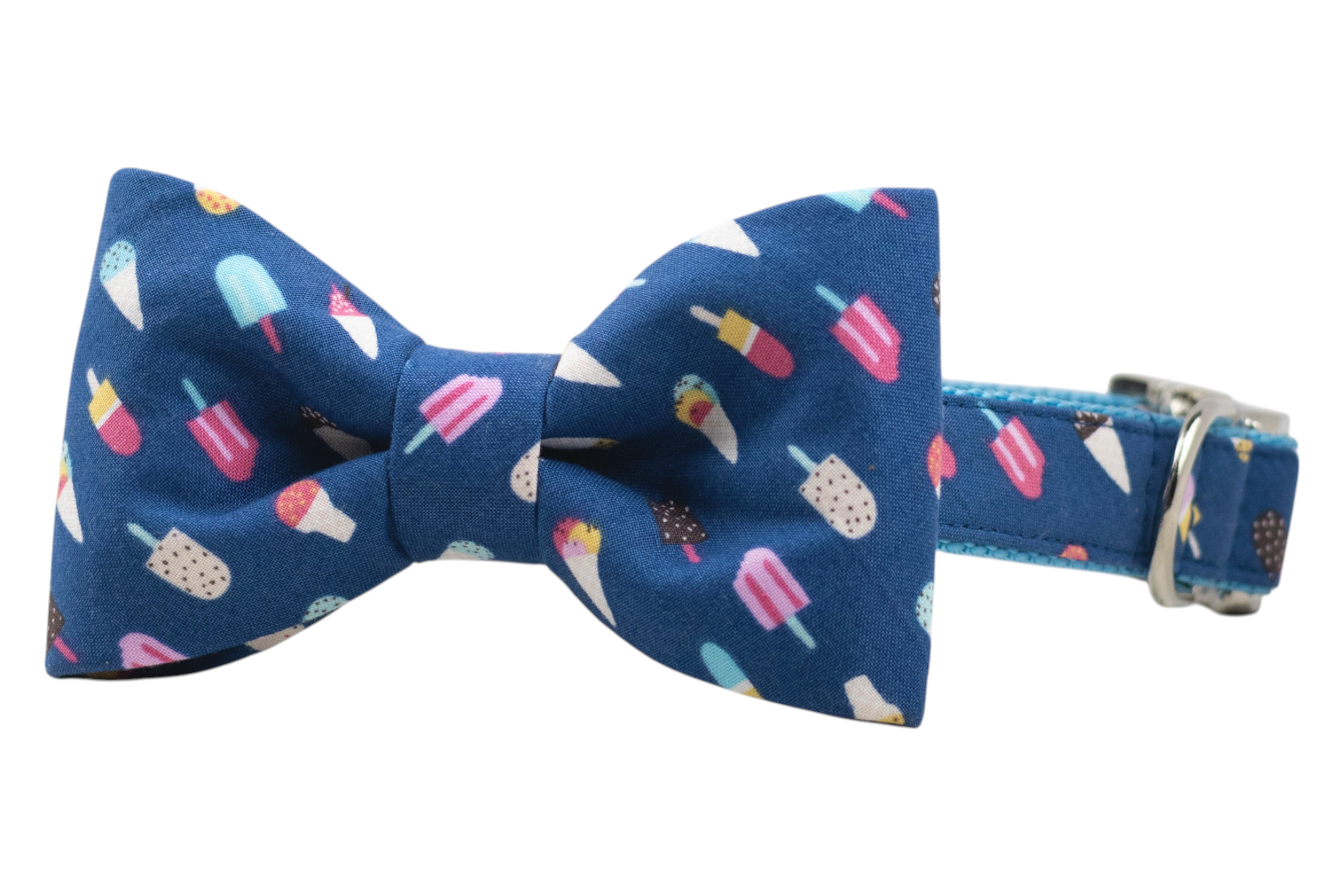 Stylish blue dog collar with a matching bow tie, both adorned with a summery pattern of popsicles and ice cream cones. The collar includes silver-tone hardware for secure fastening, and the bow tie is firmly sewn at the front, combining function with fun fashion.