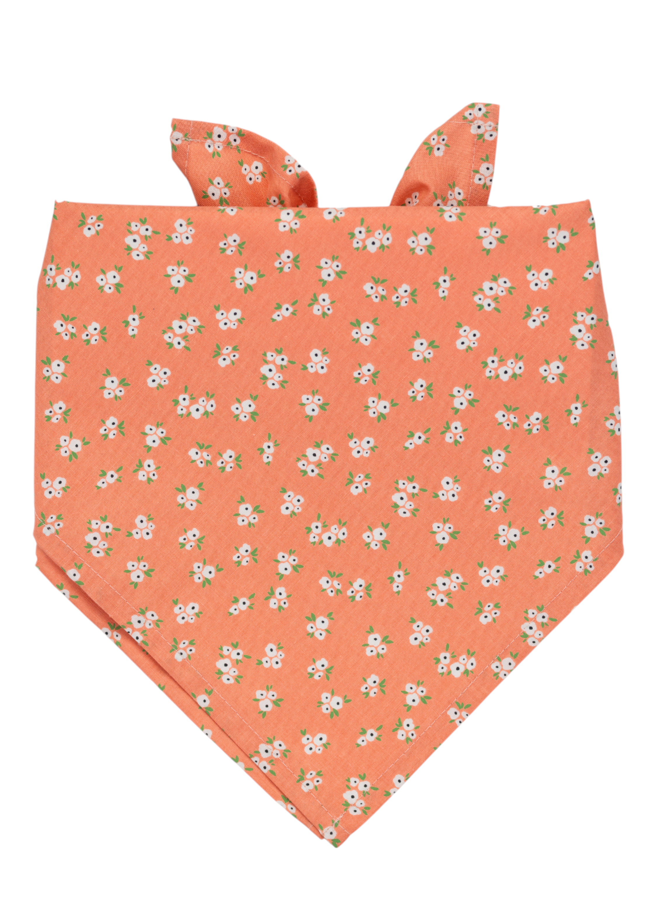 Bright orange-colored bandana featuring a scattered print of tiny white flowers with green accents. The top corners are tied into playful, ear-like shapes.