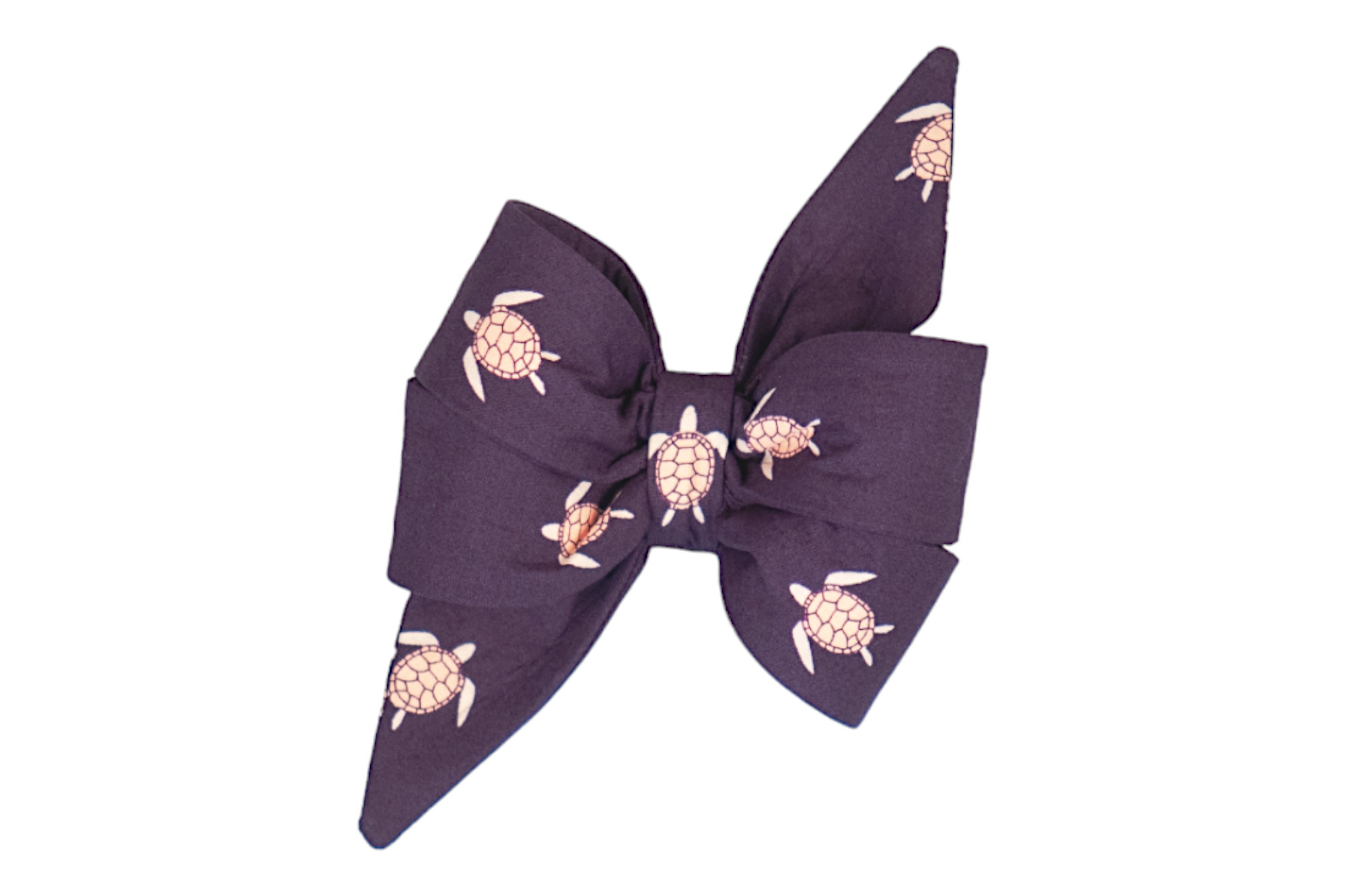 A large, structured fabric dog belle bow in dark purple, printed with repeating illustrations of sea turtles. Each turtle features a segmented shell and flippers. The belle bow has exaggerated, pointed ends and is cinched tightly at the center, creating a full, layered, and chic look.