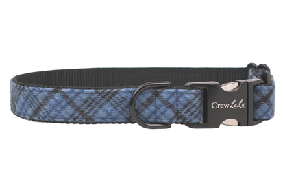 Blue flannel plaid dog collar featuring a metal buckle engraved with the brand name "Crew LaLa". The collar includes a D-ring for attachment and has a durable inner nylon lining.