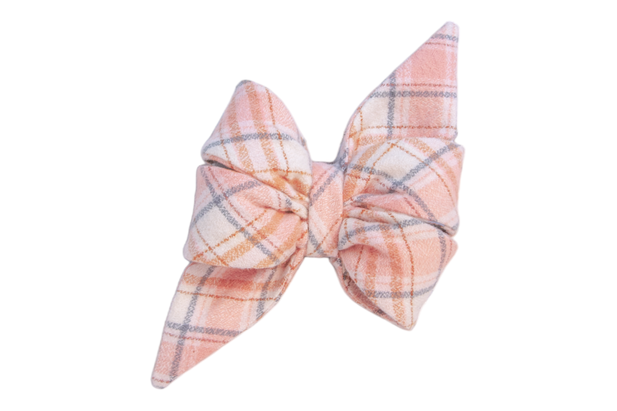 Perfect for cozy days, this flannel plaid girl dog belle bow in gentle peach and cream tones is a must-have Fall and Winter accessory.