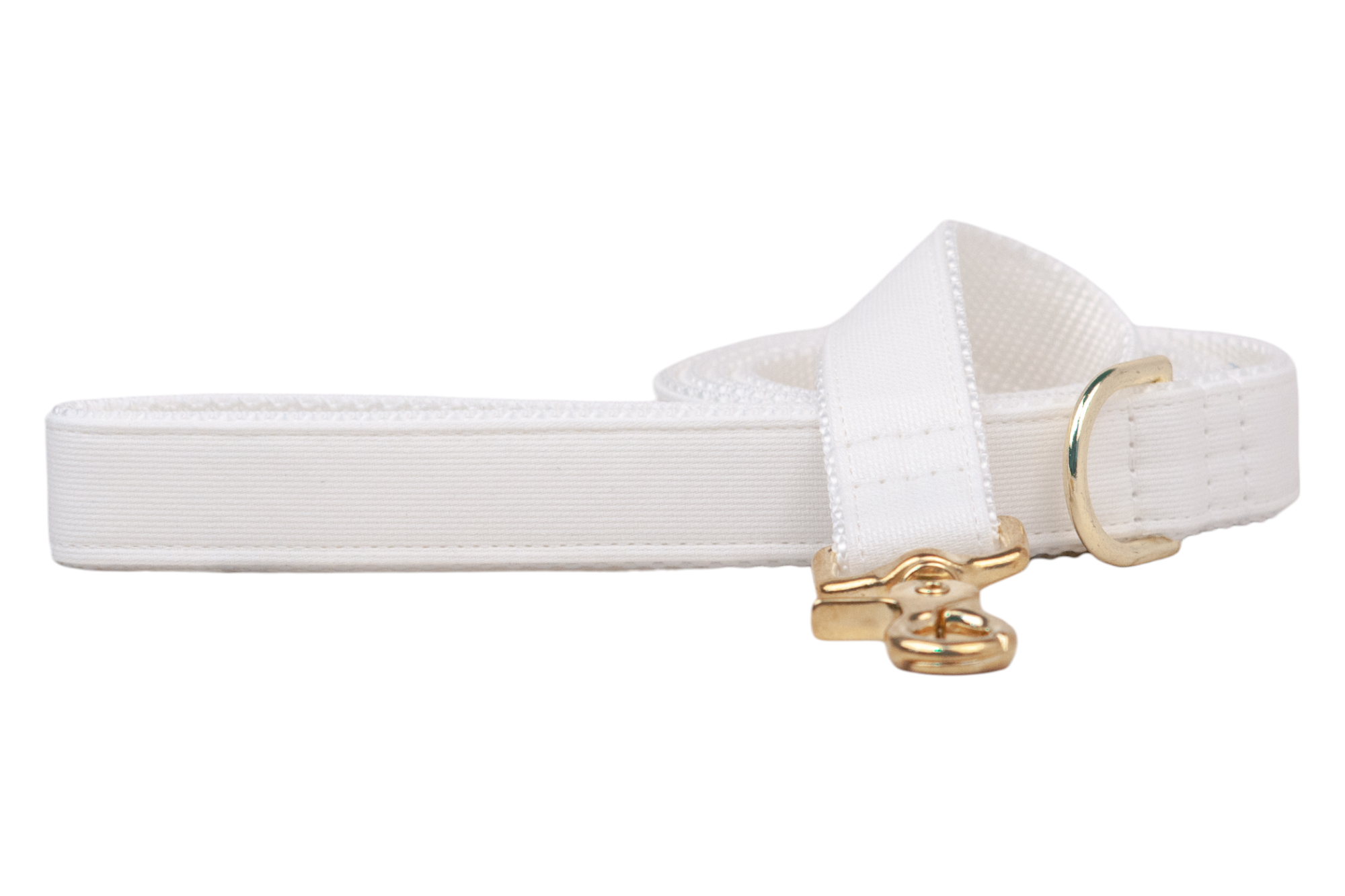 Elegant white dog leash made from durable woven material, accented with gold-toned metal components including a clip and D-ring, neatly arranged on a white backdrop.