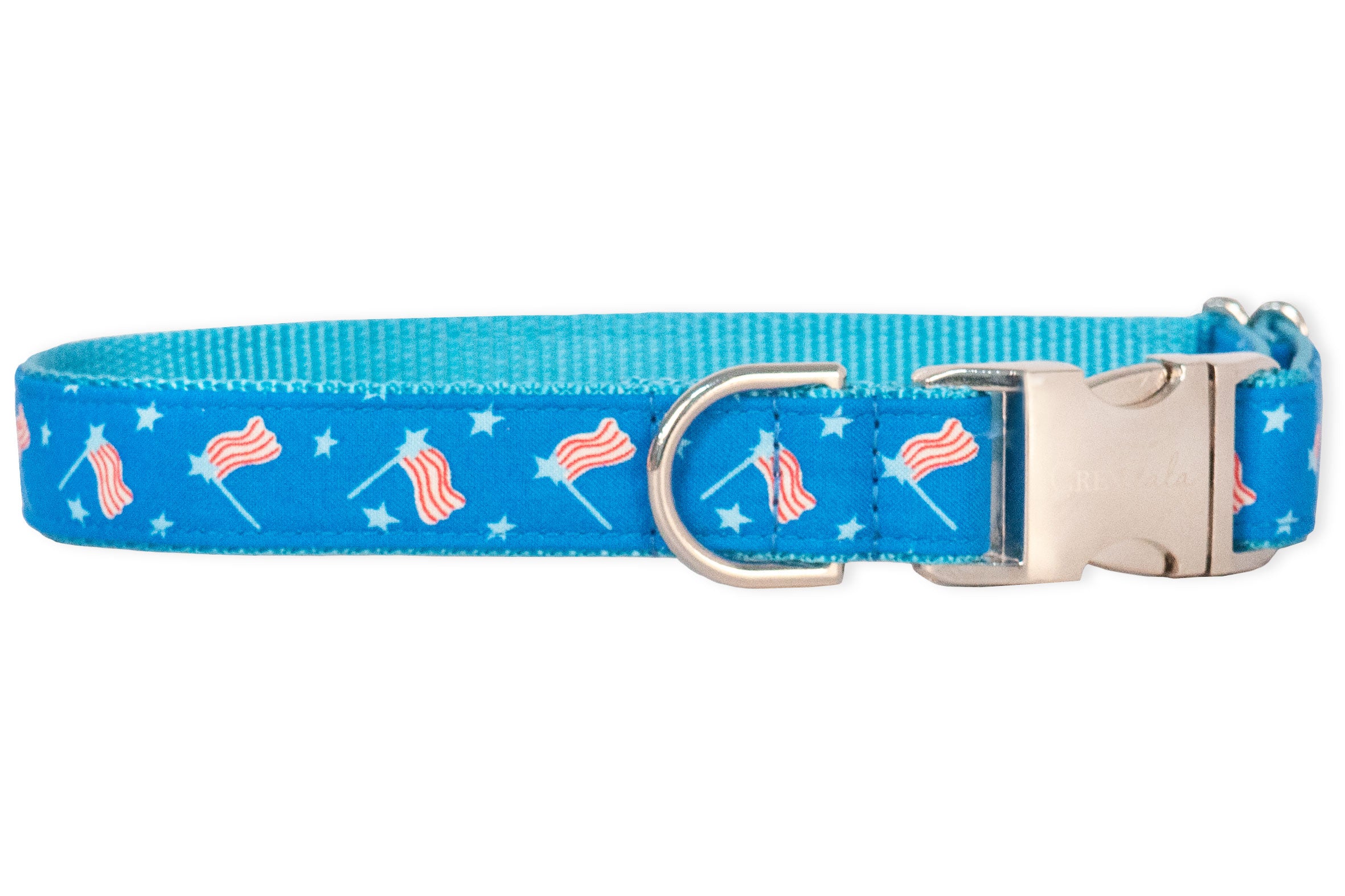 Patriotic dog collar with a vibrant blue strap covered in small American flags and stars, finished with polished silver-tone hardware and a sturdy side-release buckle.