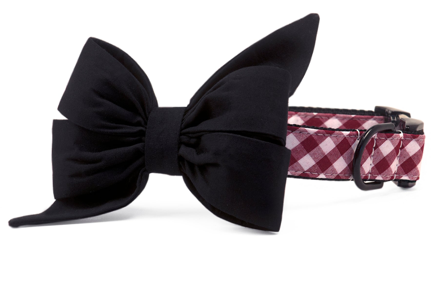 This classy belle bow dog collar combines a sleek black bow with a maroon buffalo check pattern, complete with durable black hardware. An elegant accessory for special occasions, game day, or everyday charm.