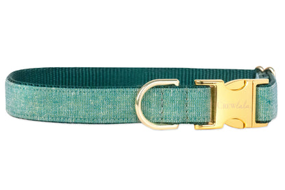 Elegant green-colored dog collar crafted from a speckled woven textile. It includes a gleaming polished side-release buckle engraved with “Crewlala” and a matching D-ring positioned at the front for functional and decorative use.
